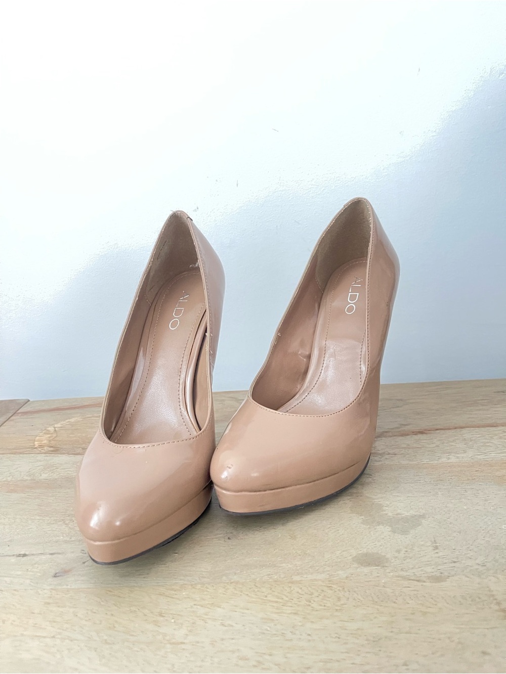Aldo Beige Patent Platform Pumps